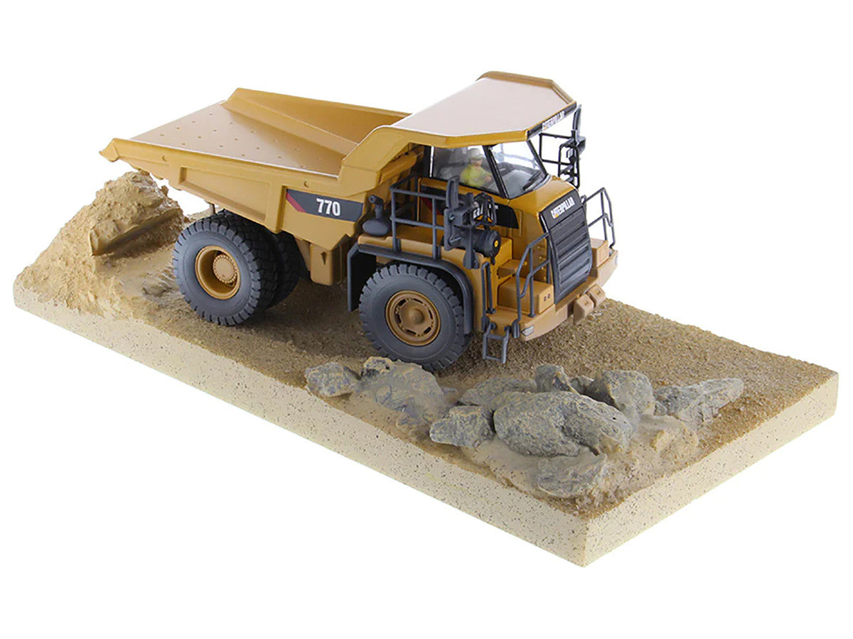 CAT Caterpillar 770 Off-Highway Truck Yellow (Weathered) with Operator "Weathered" Series 1/50 Diecast Model by Diecast Masters by Diecast Masters