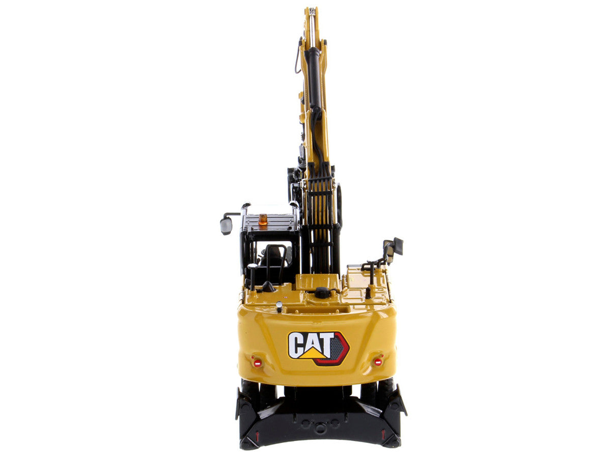 CAT Caterpillar M318 Wheeled Excavator Yellow with Operator "High Line" Series 1/50 Diecast Model by Diecast Masters by Diecast Masters