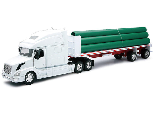 Volvo VN-780 Truck with Flatbed Trailer and Long Pipes White "Long Haul Truckers" Series 1/32 Diecast Model by New Ray by New Ray