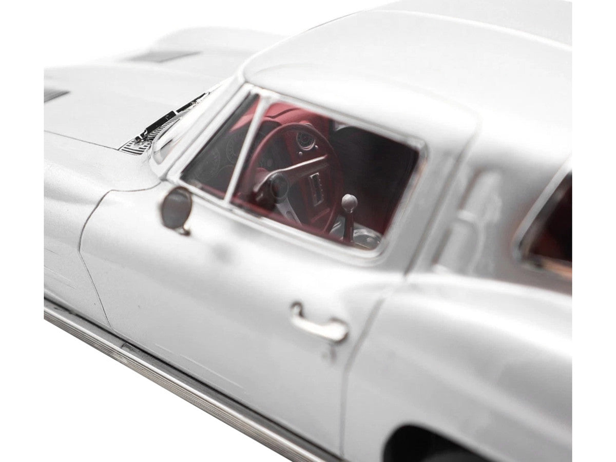 1963 Chevrolet Corvette Sting Ray Sebring Silver Metallic with Red Interior 1/18 Diecast Model Car by Norev by Norev