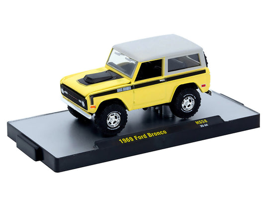 1969 Ford Bronco Yellow with Black Stripes and Gray Top Limited Edition to 6380 pieces Worldwide 1/64 Diecast Model Car by M2 Machines by M2