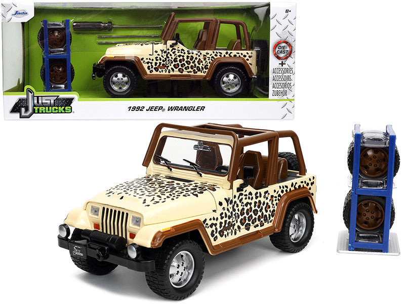 1992 Jeep Wrangler Tan and Brown with Graphics and Extra Wheels "Just Trucks" Series 1/24 Diecast Model Car by Jada by Jada
