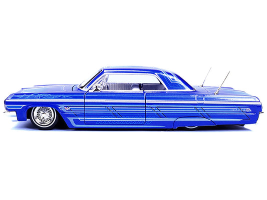 1964 Chevrolet Impala SS Lowrider Candy Blue with Graphics and White Interior "Lowriders" "Maisto Design" Series 1/26 Diecast Model Car by Maisto by Maisto