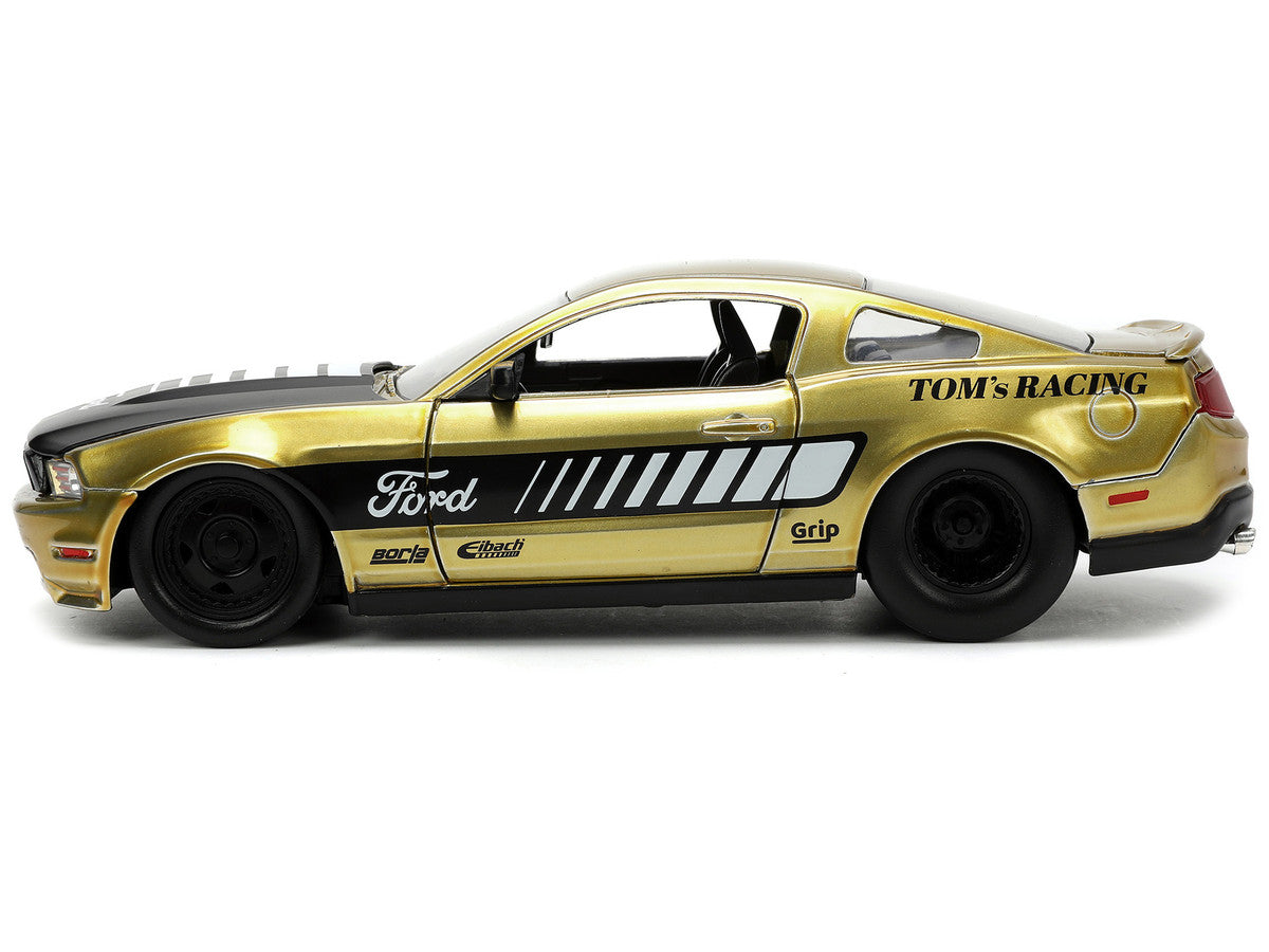 2010 Ford Mustang GT Gold Metallic with Black Graphics and Hood "Tom's Racing" "Bigtime Muscle" Series 1/24 Diecast Model Car by Jada by Jada