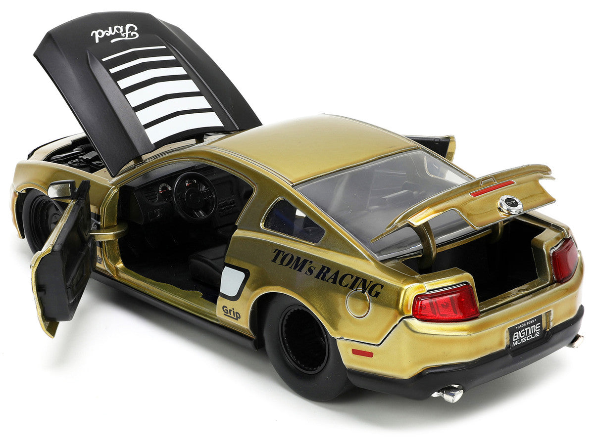 2010 Ford Mustang GT Gold Metallic with Black Graphics and Hood "Tom's Racing" "Bigtime Muscle" Series 1/24 Diecast Model Car by Jada by Jada