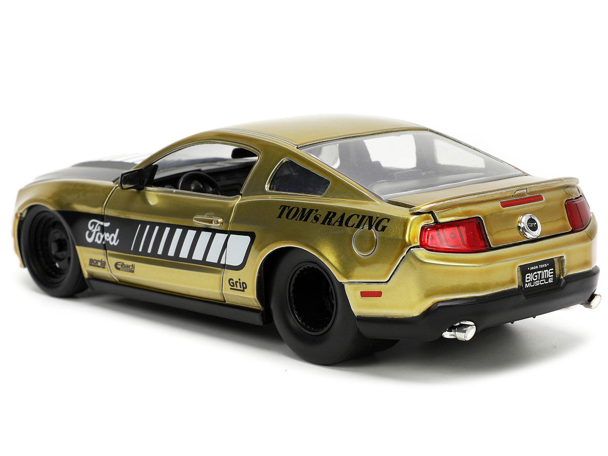 2010 Ford Mustang GT Gold Metallic with Black Graphics and Hood "Tom's Racing" "Bigtime Muscle" Series 1/24 Diecast Model Car by Jada by Jada