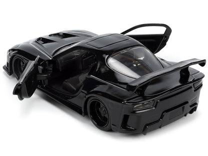 1995 Mazda RX-7 RHD (Right Hand Drive) Black and Black Panther Diecast Figure "The Avengers" "Hollywood Rides" Series 1/32 Diecast Model Car by Jada by Jada
