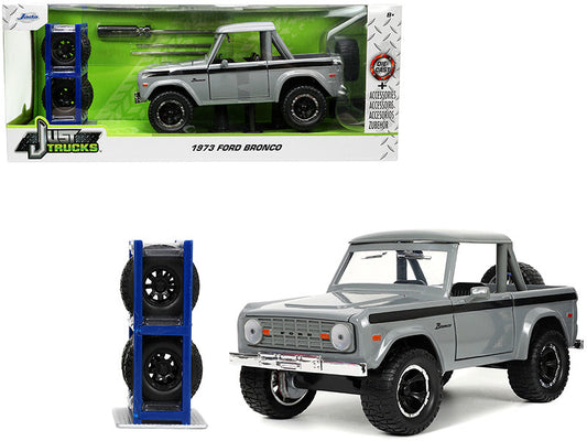 1973 Ford Bronco Pickup Truck Gray with Black Stripes with Extra Wheels "Just Trucks" Series 1/24 Diecast Model Car by Jada by Jada