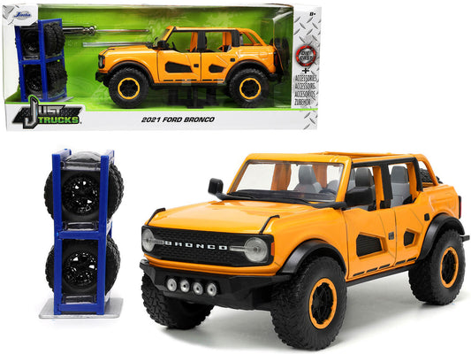 2021 Ford Bronco Orange Metallic with Extra Wheels "Just Trucks" Series 1/24 Diecast Model Car by Jada by Jada