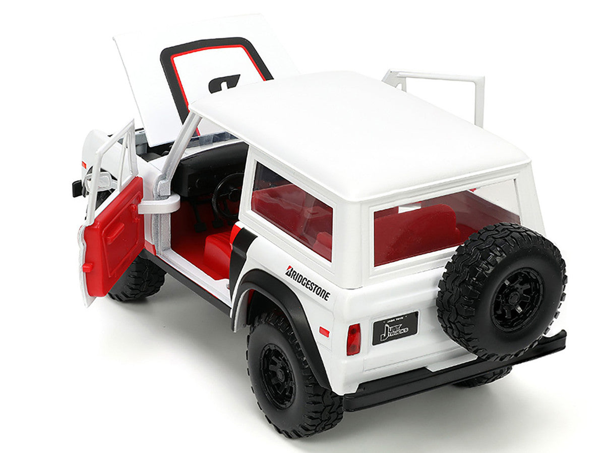 1973 Ford Bronco #008 White with Red and Black Stripes and Red Interior with Extra Wheels "Just Trucks" Series 1/24 Diecast Model Car by Jada by Jada
