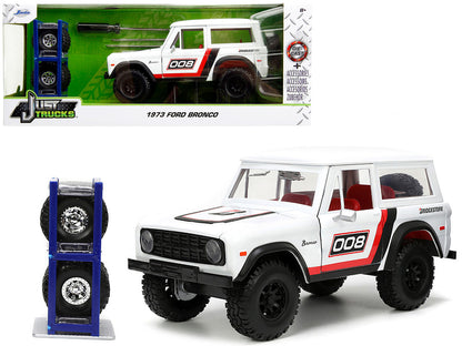 1973 Ford Bronco #008 White with Red and Black Stripes and Red Interior with Extra Wheels "Just Trucks" Series 1/24 Diecast Model Car by Jada by Jada