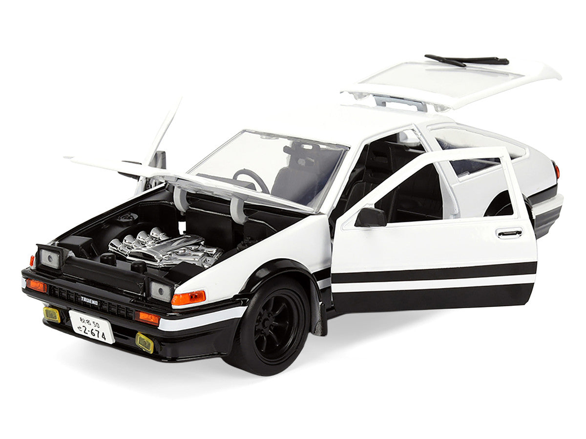 Toyota Trueno (AE86) RHD (Right Hand Drive) White and Black with Graphics and Takumi Diecast Figure "Initial D" (1998-2021) TV Series "Anime Hollywood Rides" Series 1/24 Diecast Model by Jada by Jada