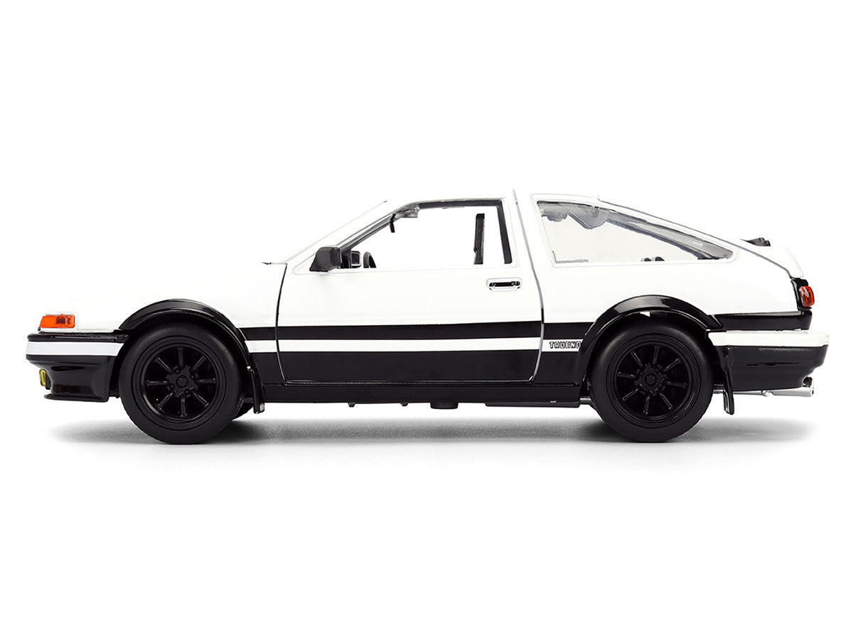 Toyota Trueno (AE86) RHD (Right Hand Drive) White and Black with Graphics and Takumi Diecast Figure "Initial D" (1998-2021) TV Series "Anime Hollywood Rides" Series 1/24 Diecast Model by Jada by Jada