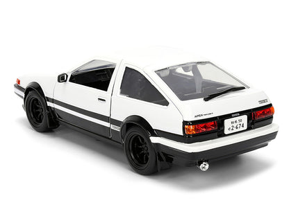 Toyota Trueno (AE86) RHD (Right Hand Drive) White and Black with Graphics and Takumi Diecast Figure "Initial D" (1998-2021) TV Series "Anime Hollywood Rides" Series 1/24 Diecast Model by Jada by Jada