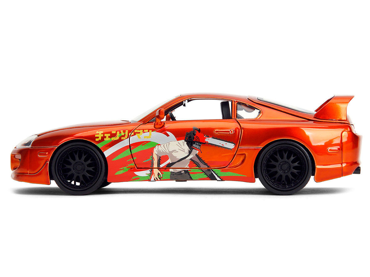 1995 Toyota Supra Orange Metallic with Graphics and Chainsaw Man Diecast Figure "Chainsaw Man" (2022) TV Series "Anime Hollywood Rides" Series 1/24 Diecast Model by Jada by Jada
