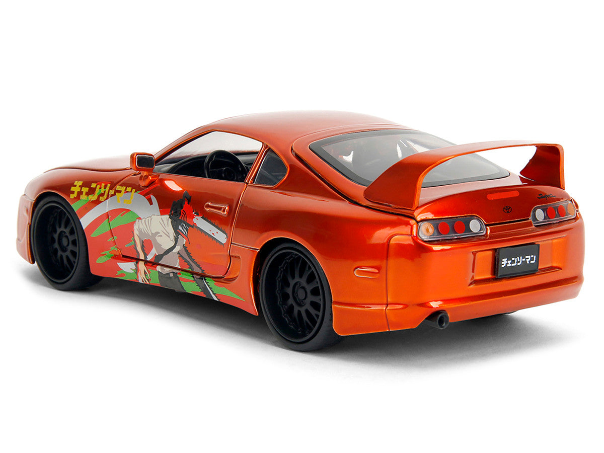 1995 Toyota Supra Orange Metallic with Graphics and Chainsaw Man Diecast Figure "Chainsaw Man" (2022) TV Series "Anime Hollywood Rides" Series 1/24 Diecast Model by Jada by Jada