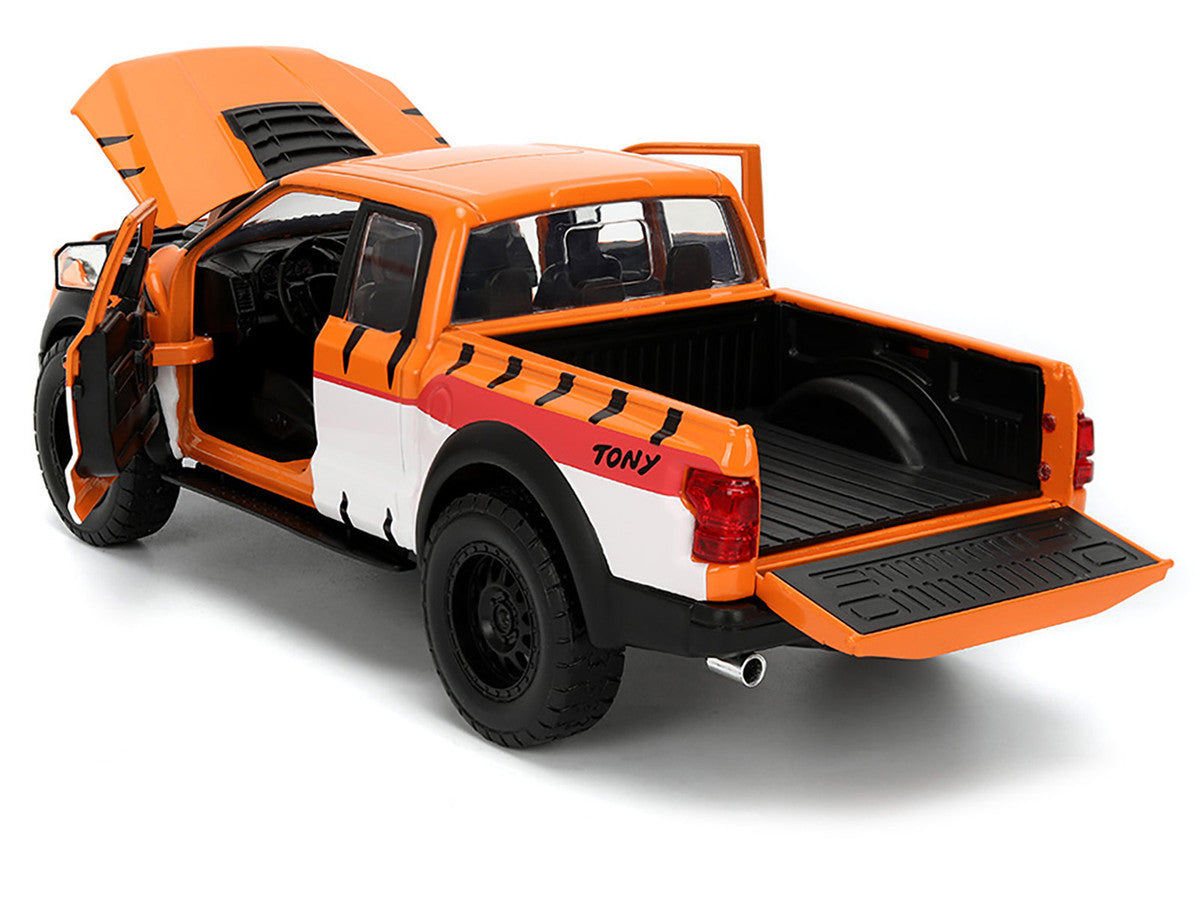 2017 Ford F-150 Raptor Pickup Truck "Frosted Flakes" Orange with Graphics and Tony the Tiger Diecast Figure "Hollywood Rides" Series 1/24 Diecast Model Car by Jada by Jada
