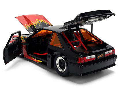 1989 Ford Mustang GT Black with Red Flame Graphics and Chester Cheetah Diecast Figure "Cheetos Flamin' Hot" "Hollywood Rides" Series 1/24 Diecast Model Car by Jada by Jada