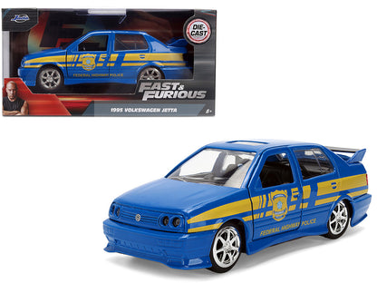 Volkswagen Jetta Police Vehicle "Rio Federal Highway Police" Blue with Yellow Stripes "Fast Five" (2011) Movie "Fast & Furious" Series 1/32 Diecast Model Car by Jada by Jada