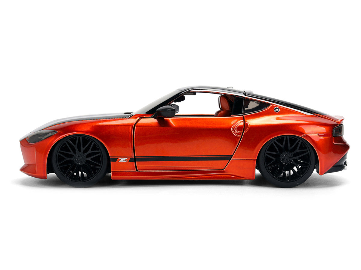 2023 Nissan Z Orange Metallic with Carbon Hood and Black Top "JDM Tuners" Series 1/24 Diecast Model Car by Jada by Jada