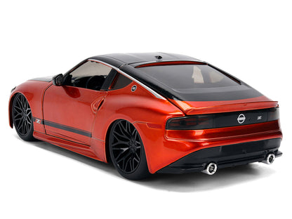 2023 Nissan Z Orange Metallic with Carbon Hood and Black Top "JDM Tuners" Series 1/24 Diecast Model Car by Jada by Jada