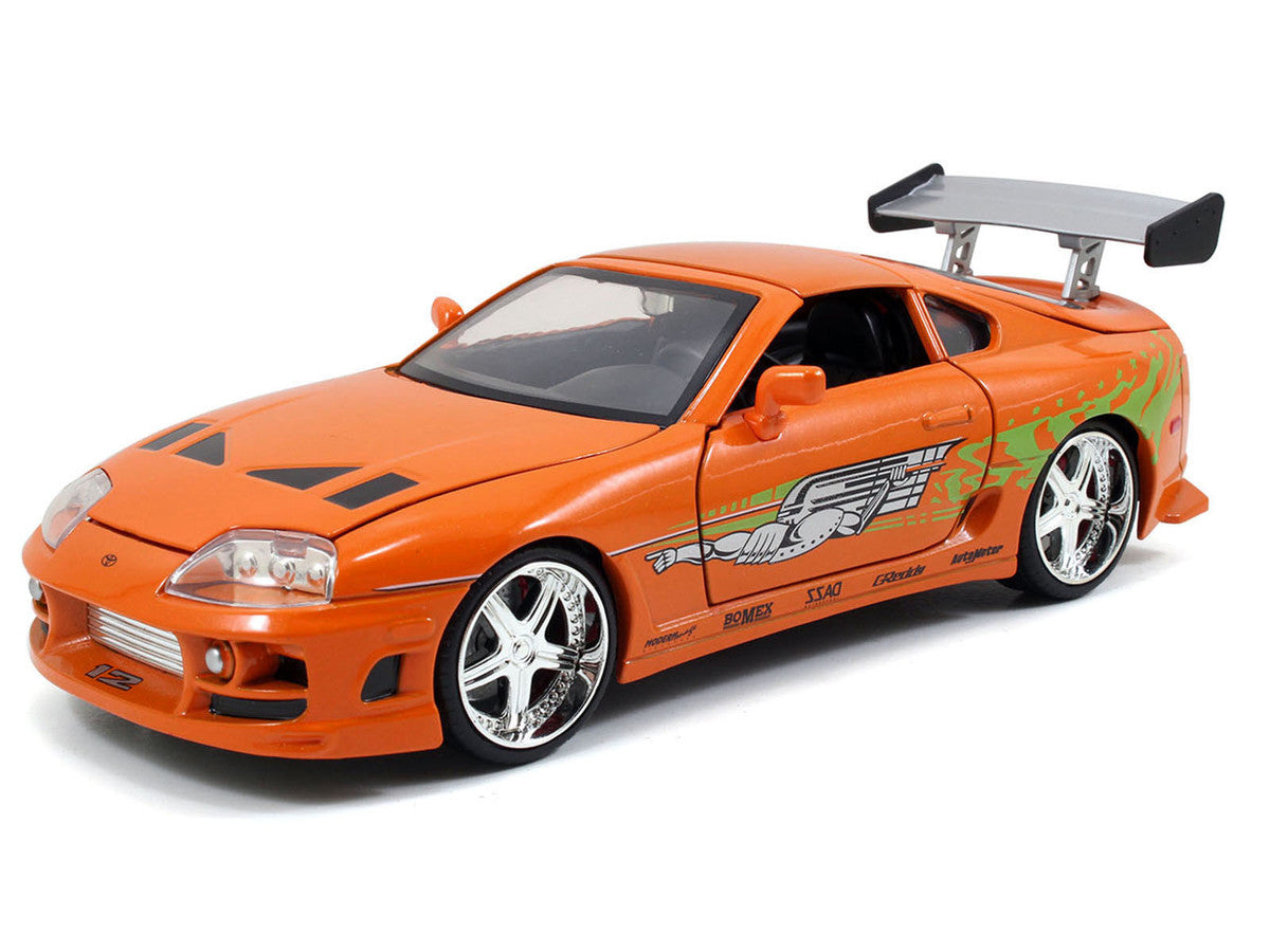 Dom's 1970 Dodge Charger R/T Black and Brian's Toyota Supra Orange with Graphics Set of 2 Cars "Fast & Furious 25th Anniversary" "Fast & Furious" Series 1/24 Diecast Model Cars by Jada by Jada