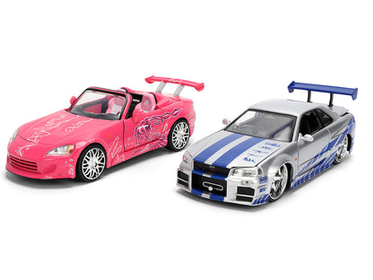 Brian's Nissan Skyline GT-R (R34) Silver Metallic with Blue Stripes and Suki's Honda S2000 Pink with Graphics Set of 2 Cars "Fast & Furious 25th Anniversary" "Fast & Furious" Series 1/24 Diecast Model Cars by Jada by Jada