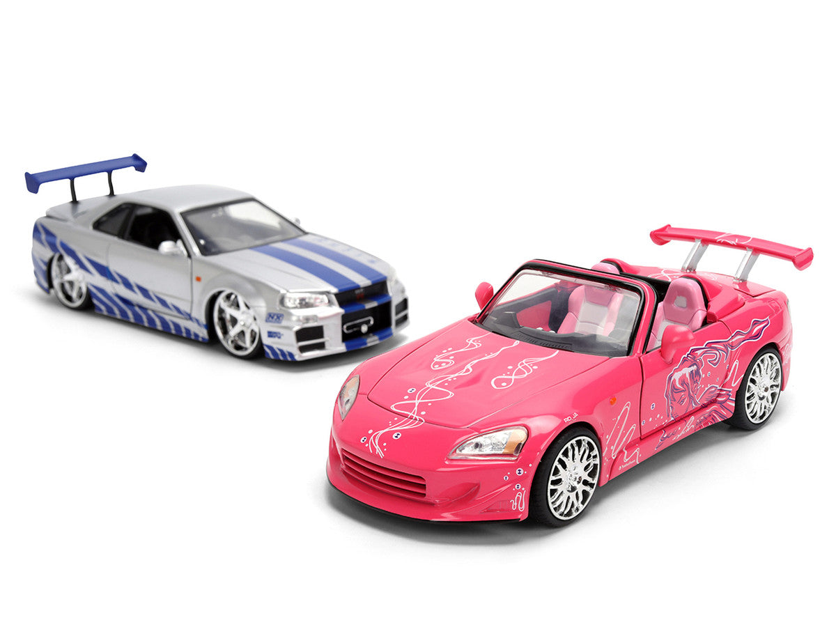 Brian's Nissan Skyline GT-R (R34) Silver Metallic with Blue Stripes and Suki's Honda S2000 Pink with Graphics Set of 2 Cars "Fast & Furious 25th Anniversary" "Fast & Furious" Series 1/24 Diecast Model Cars by Jada by Jada