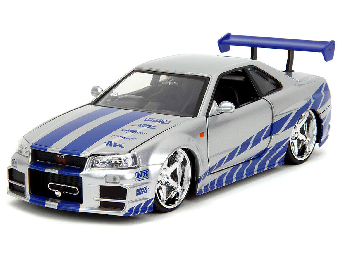 Brian's Nissan Skyline GT-R (R34) Silver Metallic with Blue Stripes and Suki's Honda S2000 Pink with Graphics Set of 2 Cars "Fast & Furious 25th Anniversary" "Fast & Furious" Series 1/24 Diecast Model Cars by Jada by Jada