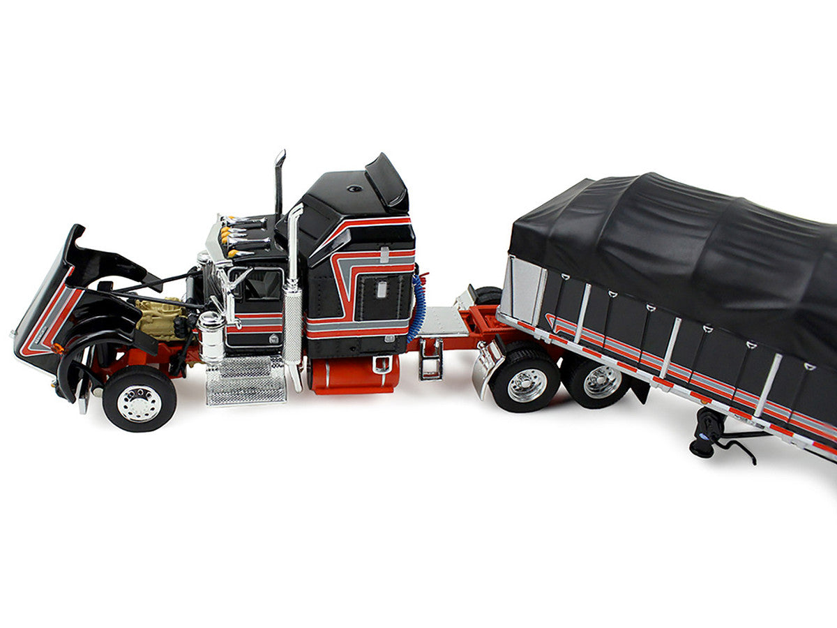 Kenworth W900A with 60" Aerodyne Sleeper and 53’ Wilson Roadbrute Flatbed Trailer with Covered Wagon Black with Red Stripes 1/64 Diecast Model by DCP/First Gear by First Gear