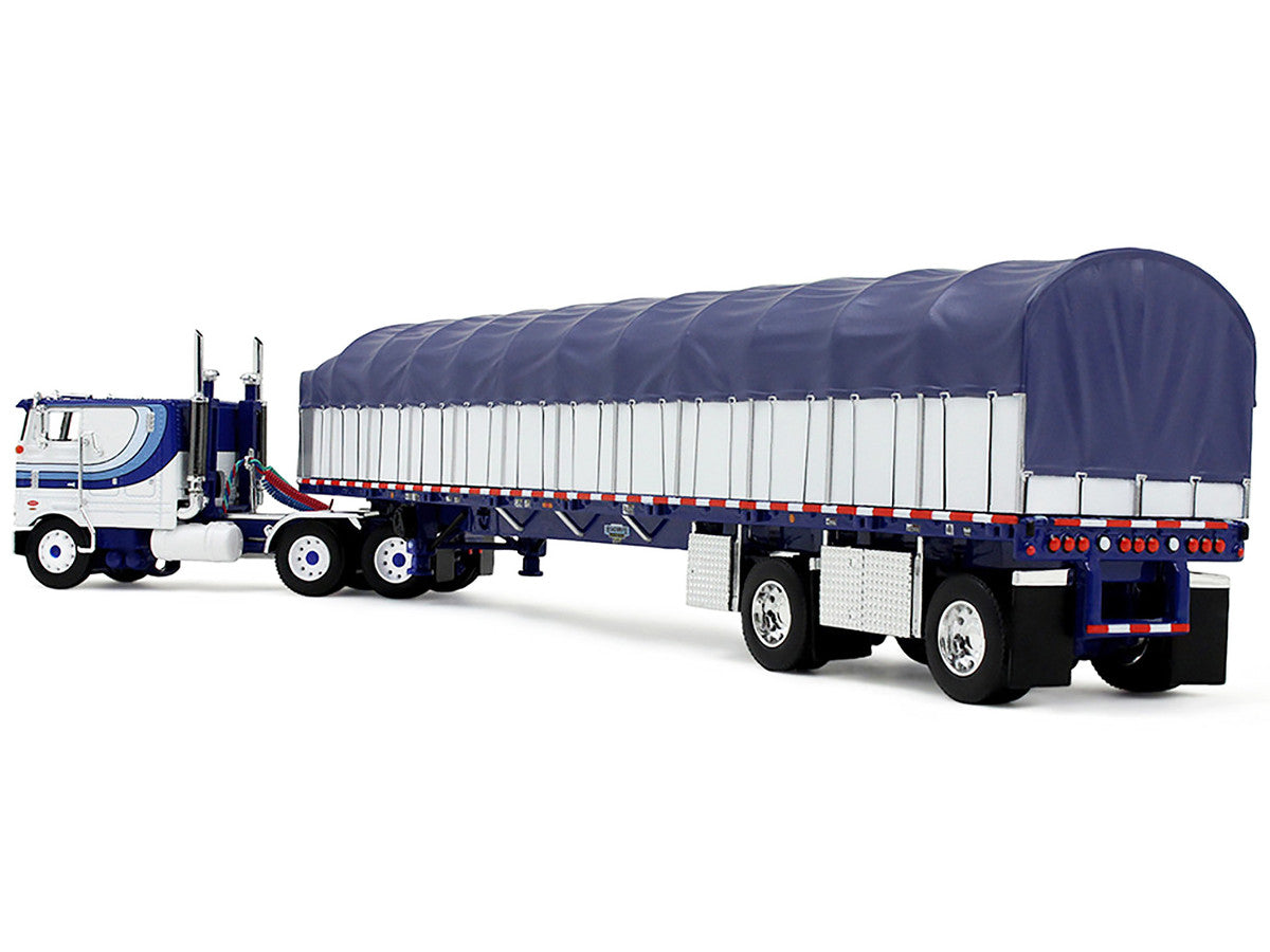 Peterbilt 352 COE 110" Sleeper and 53’ Wilson Roadbrute Flatbed Trailer with Covered Wagon White with Blue Stripes 1/64 Diecast Model by DCP/First Gear by First Gear