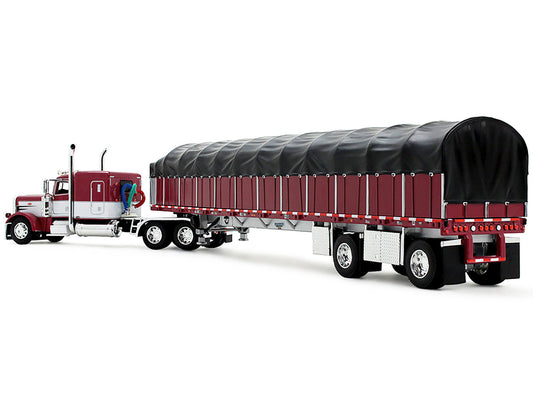 Peterbilt 389 with 63" Flat Top Sleeper and 53’ Wilson Roadbrute Flatbed Trailer with Covered Wagon Maroon with White Stripes 1/64 Diecast Model by DCP/First Gear by First Gear