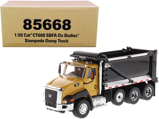 CAT Caterpillar CT660 SBFA with Ox Bodies Stampede Dump Truck Yellow and Black 1/50 Diecast Model by Diecast Masters by Diecast Masters