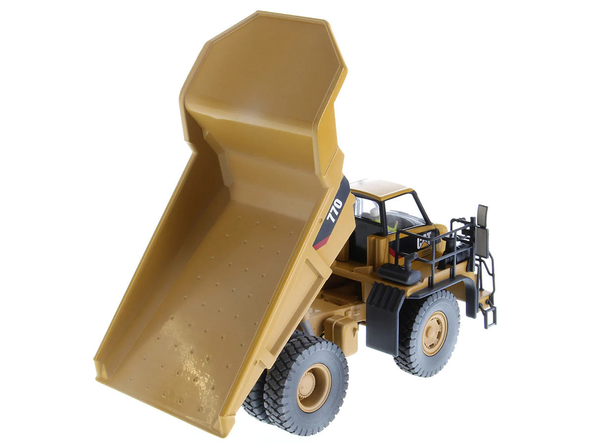 CAT Caterpillar 770 Off-Highway Truck Yellow (Weathered) with Operator "Weathered" Series 1/50 Diecast Model by Diecast Masters by Diecast Masters