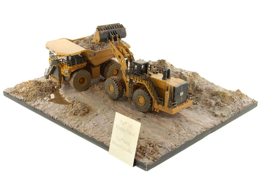 CAT Caterpillar 994K Wheel Loader and 797 Mining Truck Yellow (Weathered) Set of 2 Pieces "Weathered Series" 1/125 Diecast Model by Diecast Masters by Diecast Masters