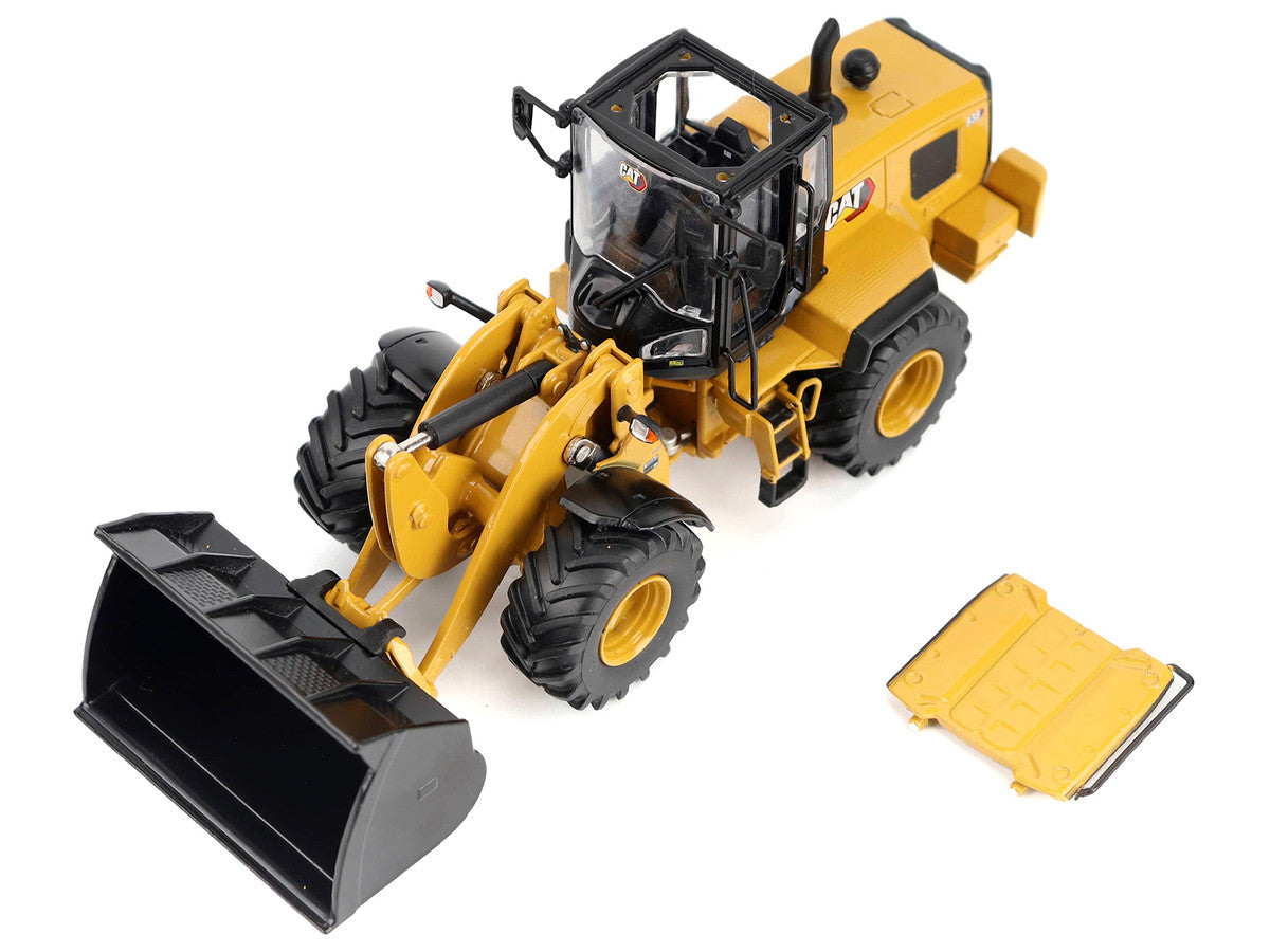 CAT Caterpillar 938 Wheel Loader with Operator Yellow "High Line" Series 1/50 Diecast Model by Diecast Masters by Diecast Masters