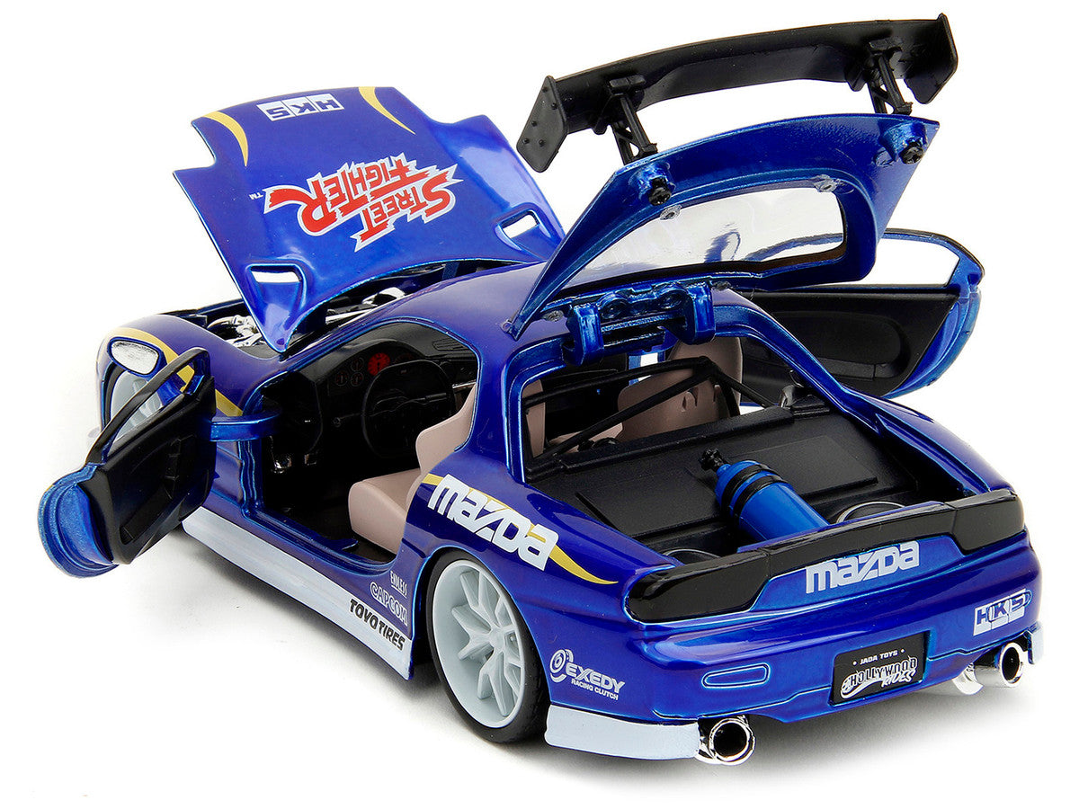 1993 Mazda RX-7 Candy Blue Metallic with Graphics and Chun-Li Diecast Figure "Street Fighter" Video Game "Anime Hollywood Rides" Series 1/24 Diecast Model Car by Jada by Jada