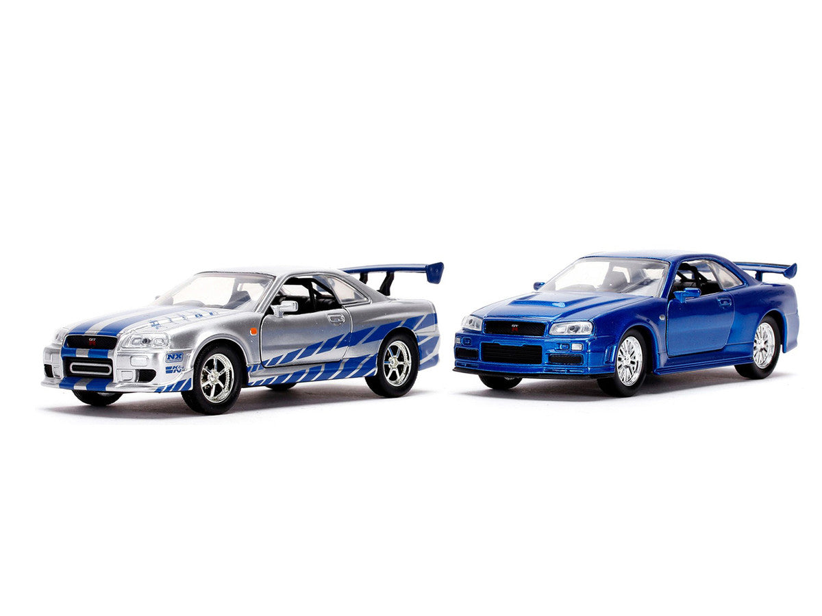 Brian's Nissan Skyline GT-R (BNR34) Silver with Blue Stripes and Nissan GT-R (BNR34) Blue Metallic Set of 2 pieces "25 Years of Fast & Furious" Series 1/32 Diecast Model Cars by Jada by Jada